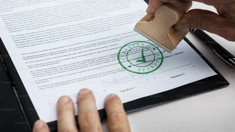 Approved stamp on credit card application form green checkmark